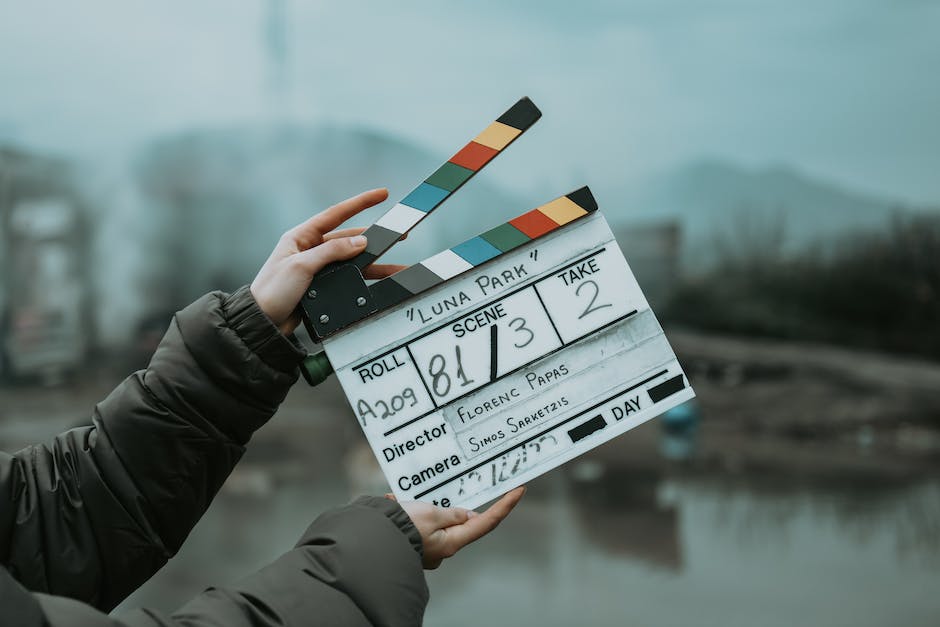 a movie clapperboard, representing the metamorphosis from novel to screen